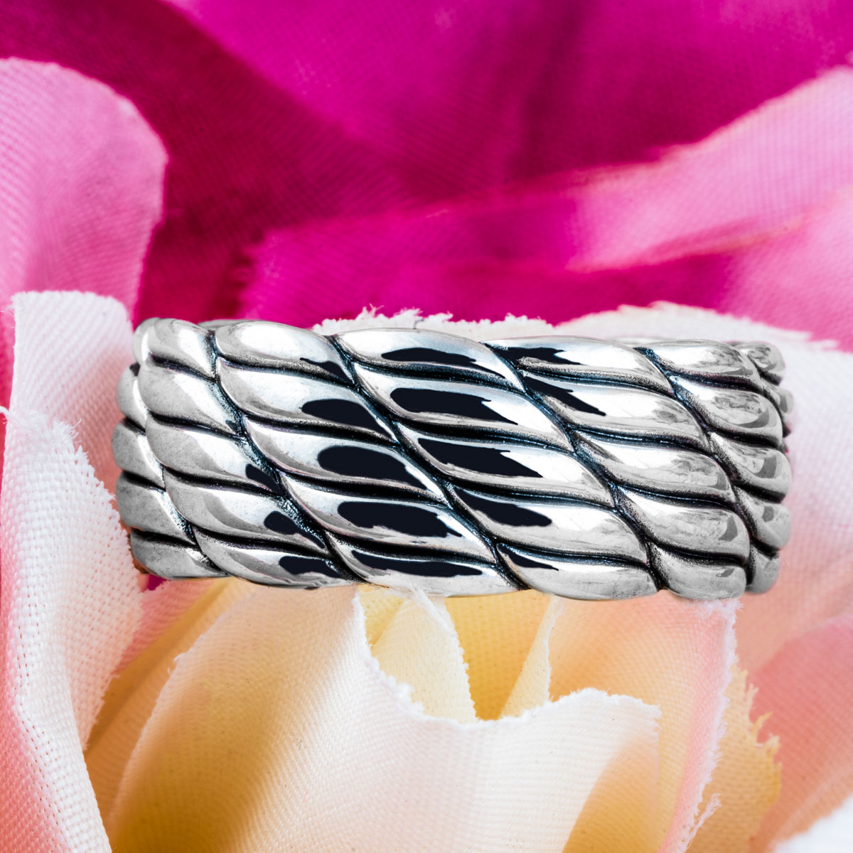 Sterling silver cable knit ring.